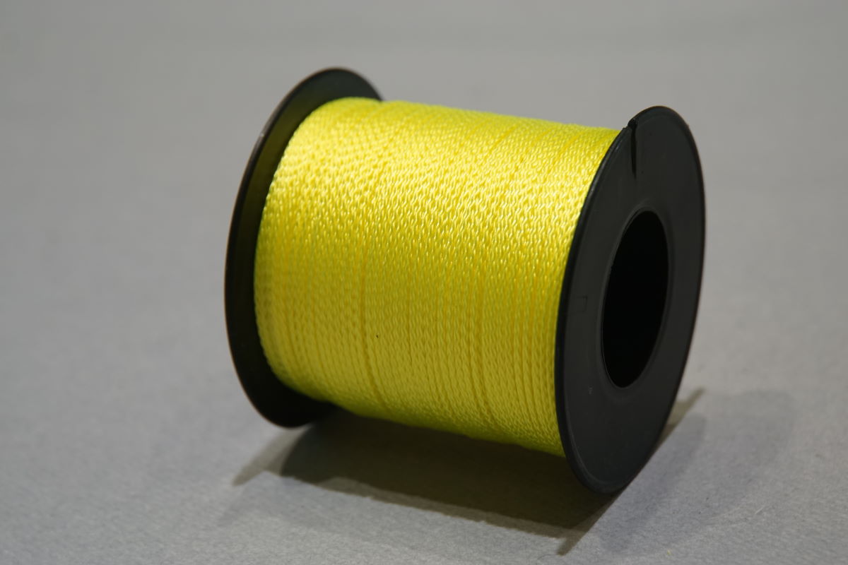 Gevlochten Nylon ø1.5 mm. - bobijnen  100 m. fluo geel